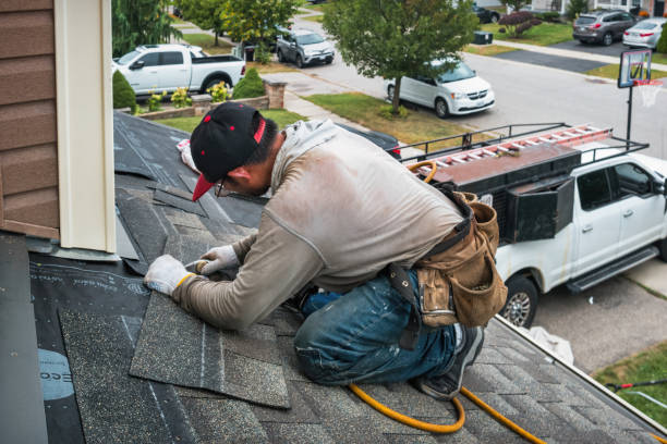 Professional Roofing technician working in Troy, IN